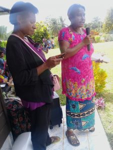 Dr-Grace-Raire-addressing-a-group-of-women-about-keeping-themselves-safe-and-checked-for-cervical-changes